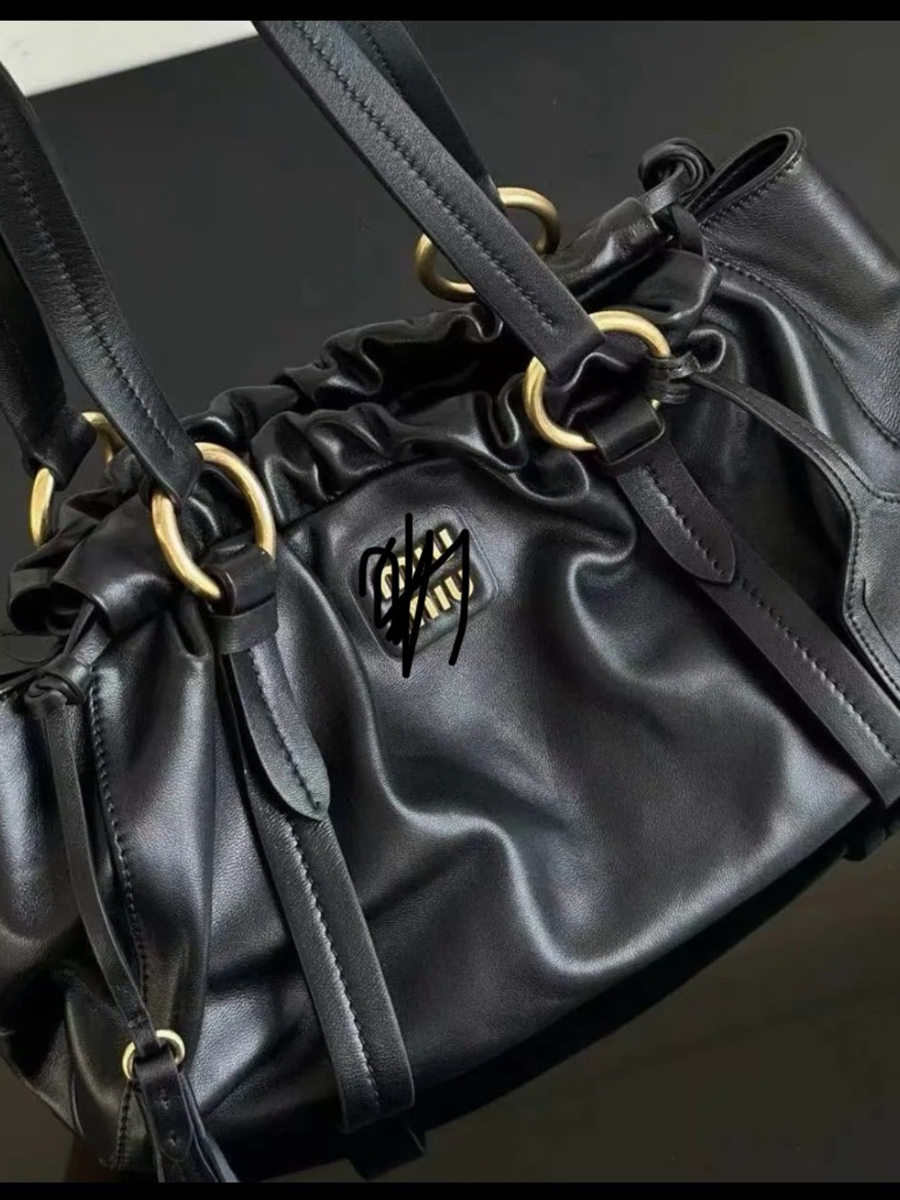 Women's Black Leather Drawstring Shoulder Bag with Gold Rings